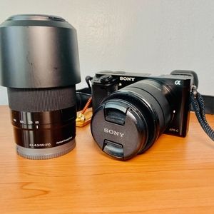 Sony A6000 with 18-55mm lens & 55-210mm lens